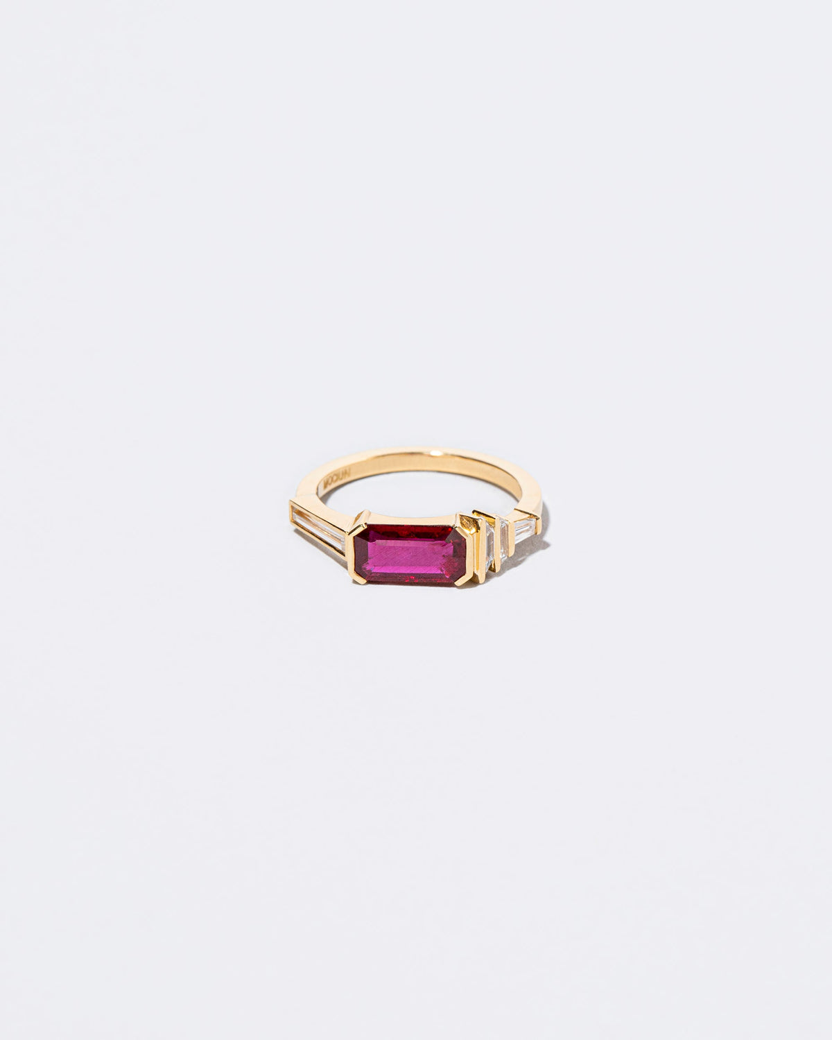 Femme Volage Ring on light color background.