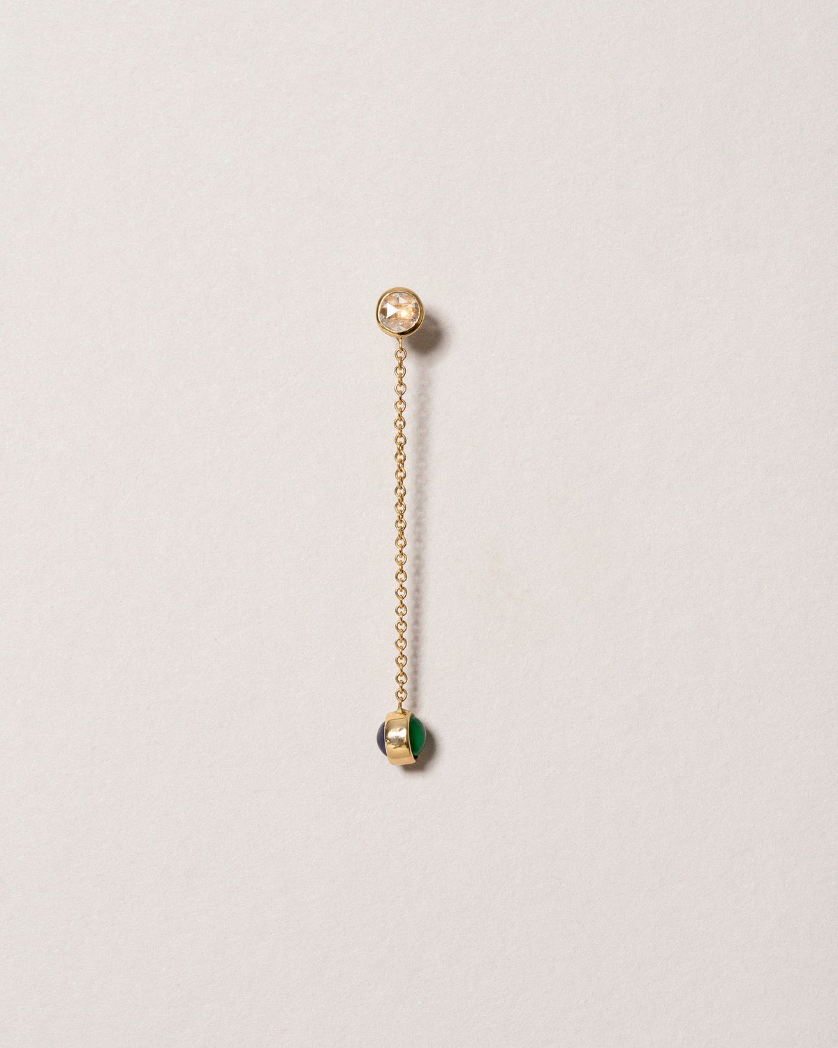 Birthstone One-Drop Single Earring on light color background.