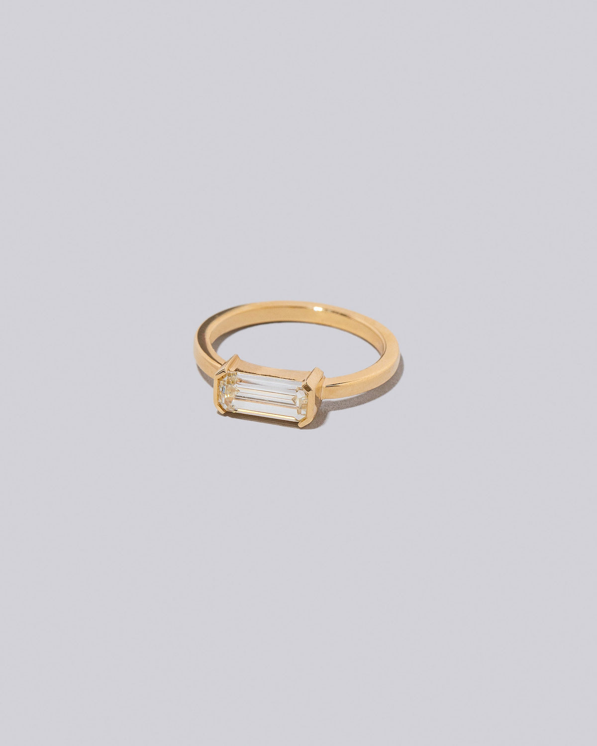 View from the side of the Vibrato Ring on light color background.