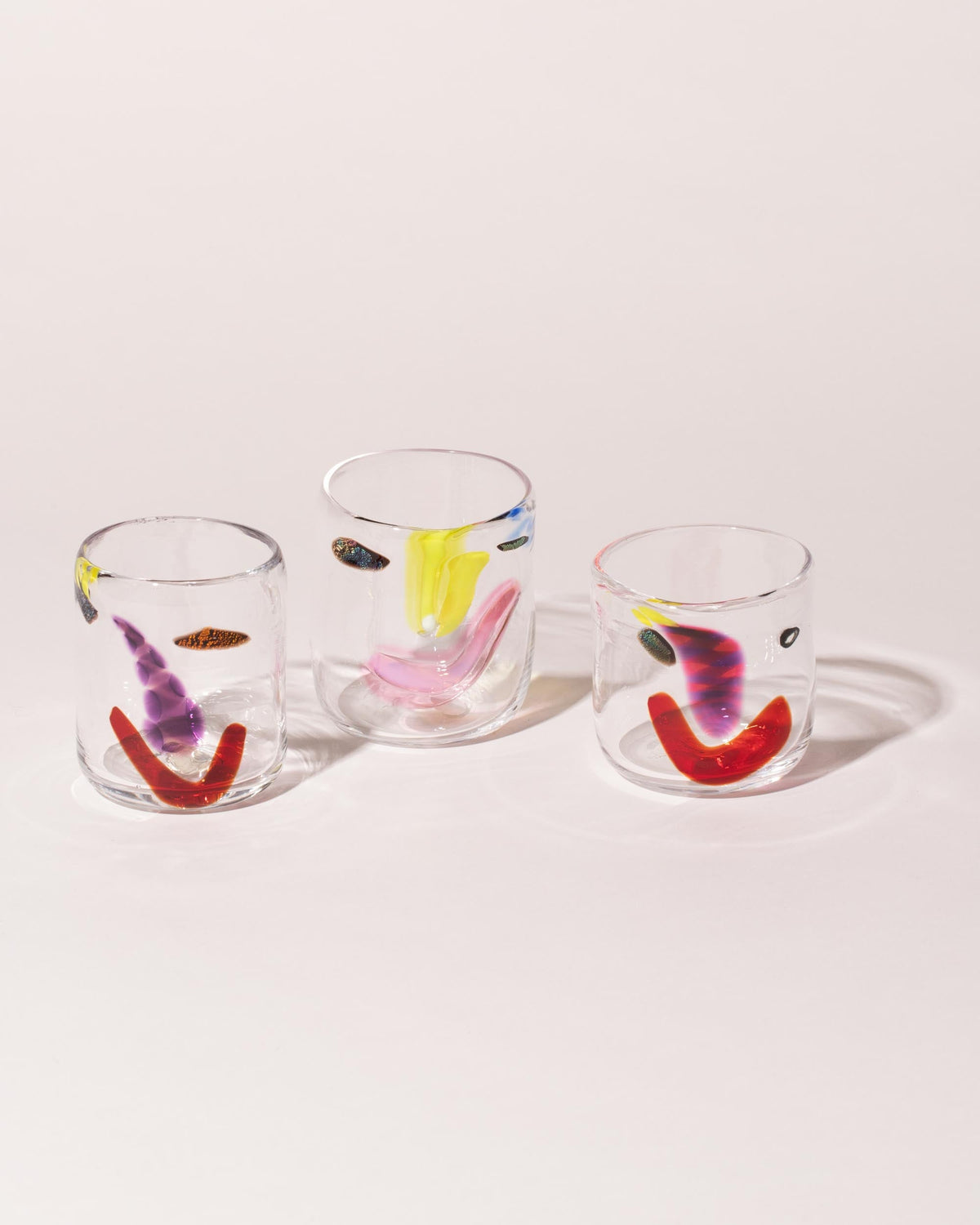 Group of FACEVESSEL Medium Face Glasses on light color background.