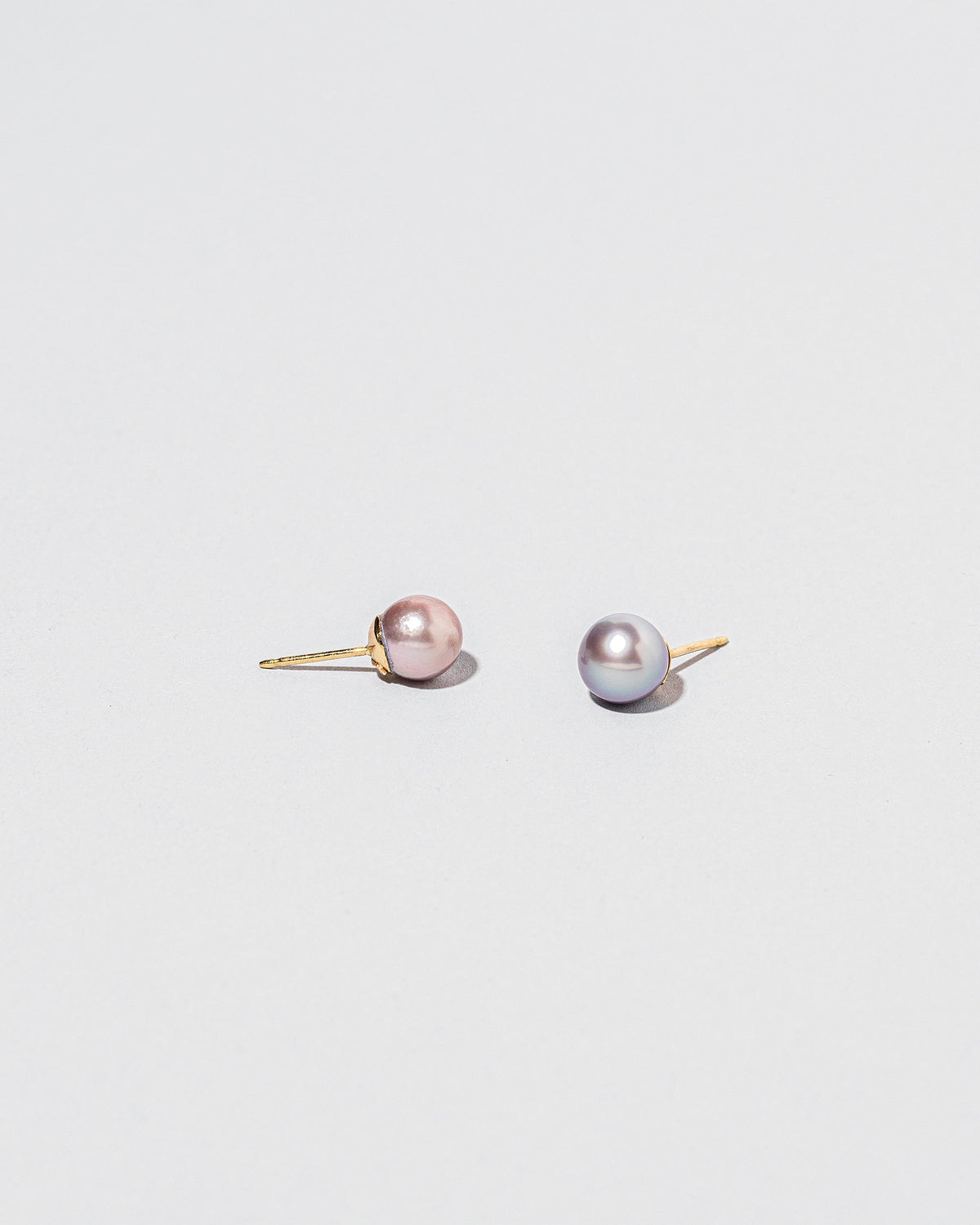 Soft Landscape Earrings, shown as studs, on light color background.