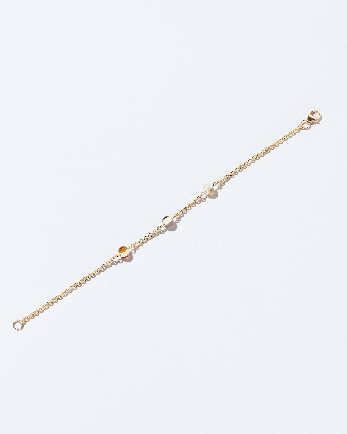  Birthstone Bracelet - Three Bezels on light color background.
