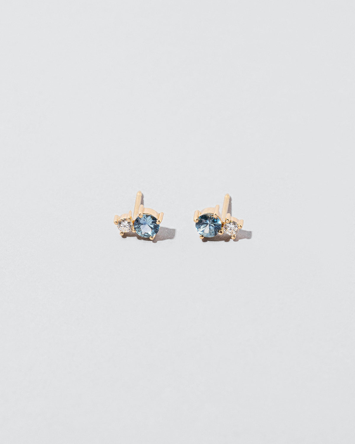  Aster Earrings on light color background.