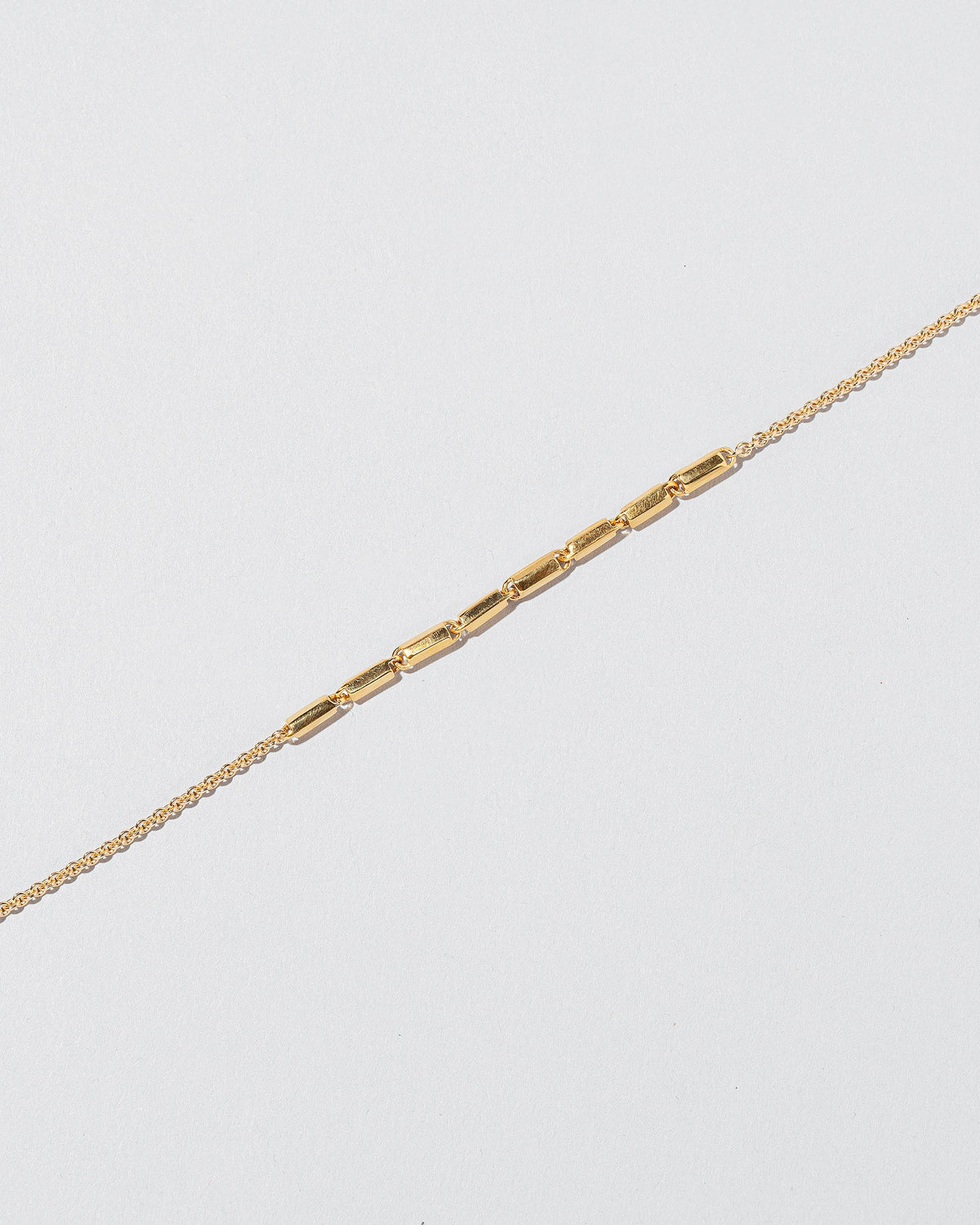  Inclusion Bracelet on light color background.