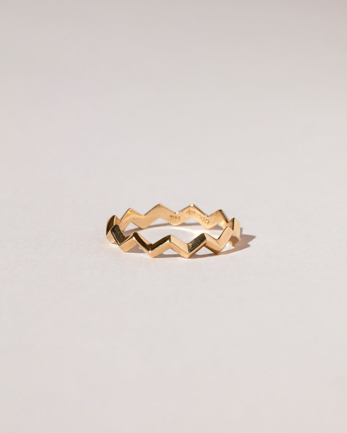 Gold Perfect Balance Band on light color background.