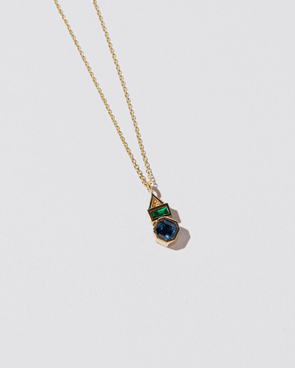  Positive Energy Necklace on light color background.