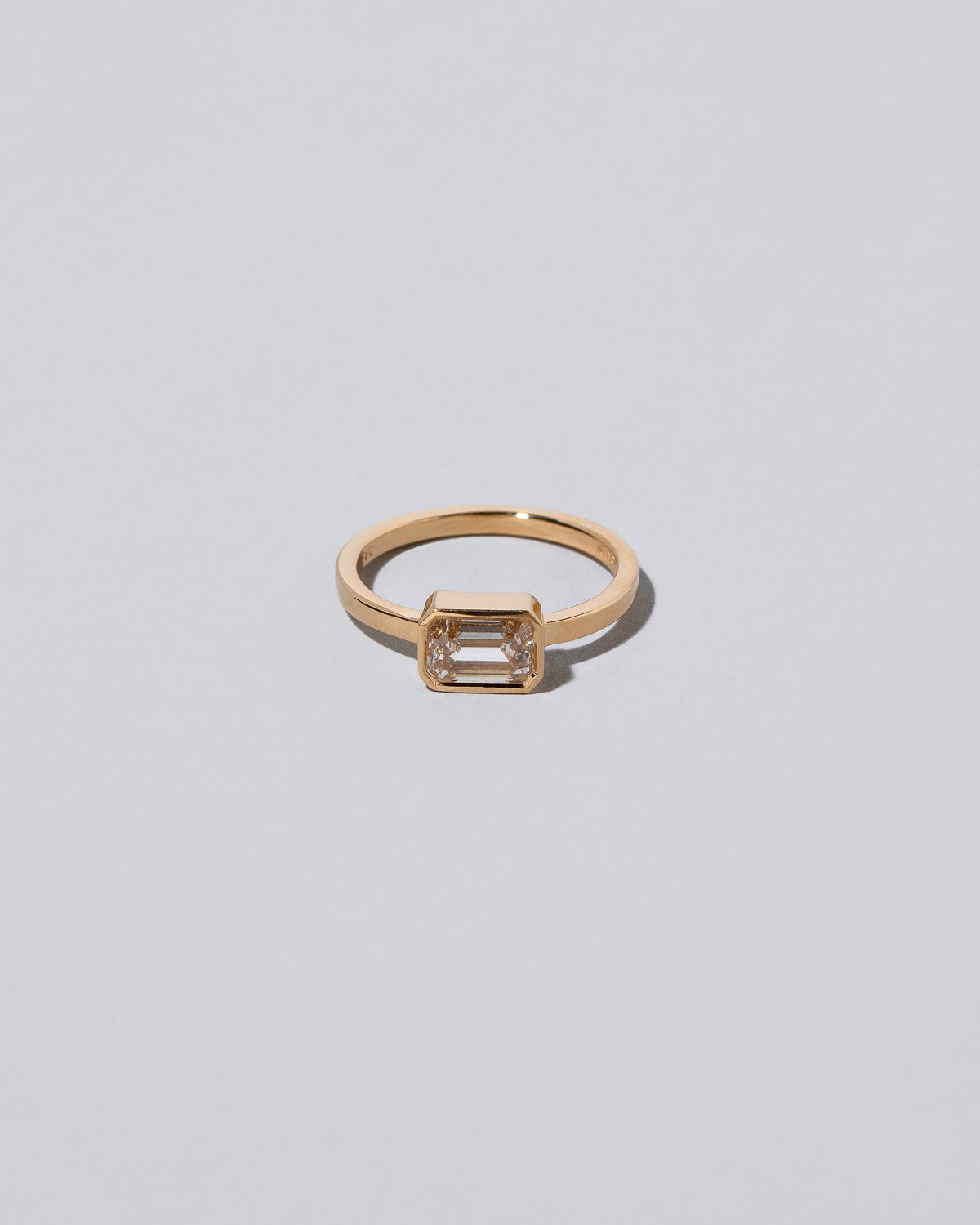 Spectrum Ring on light color background.