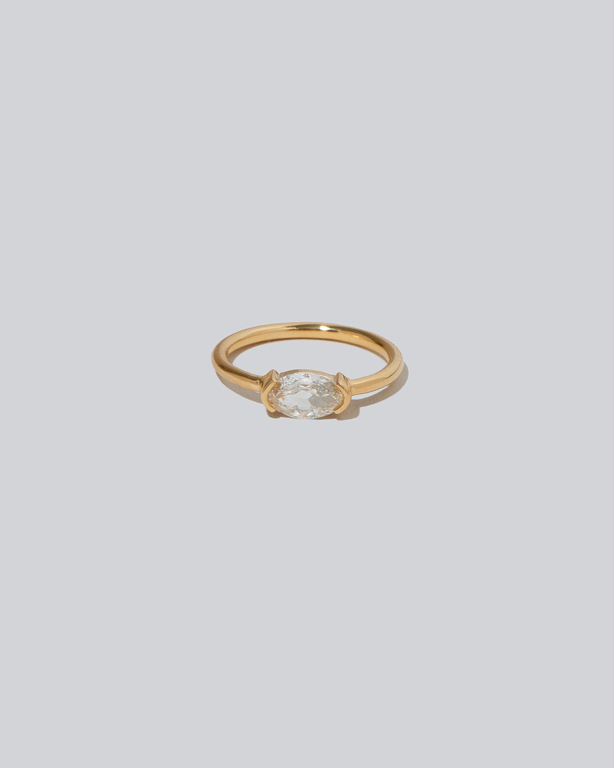 De Coté Ring on light color background.