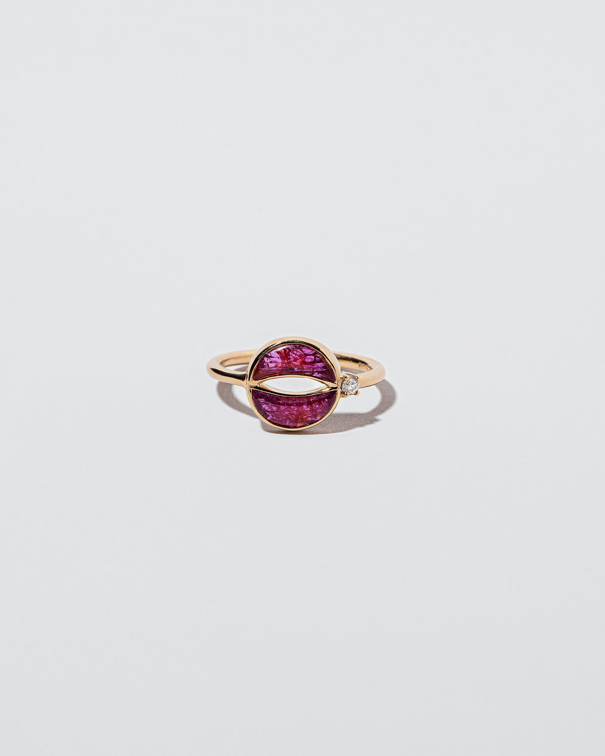 Rebirth Ring on light color background.