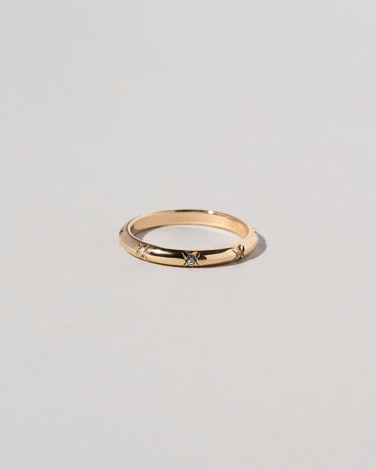  Half Round Studded Band on light color background.