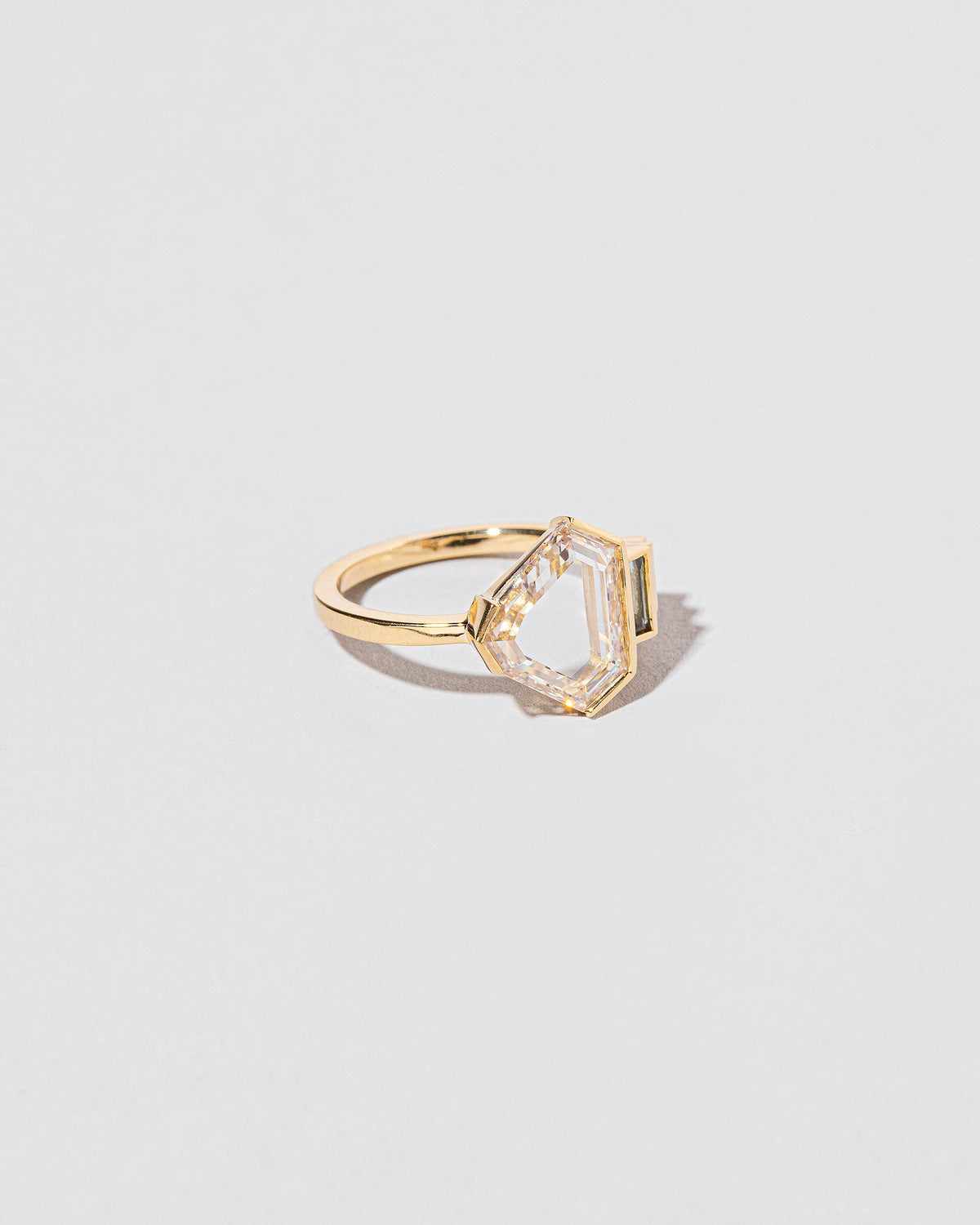  Transcendence Ring on light color background.