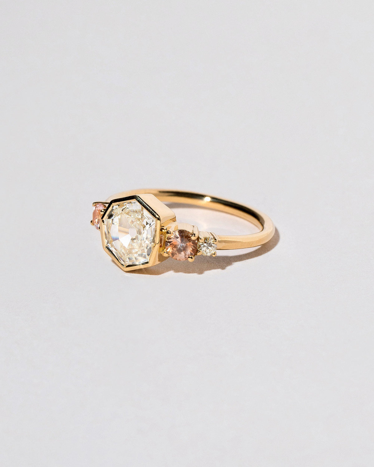  Theia Ring on light color background.