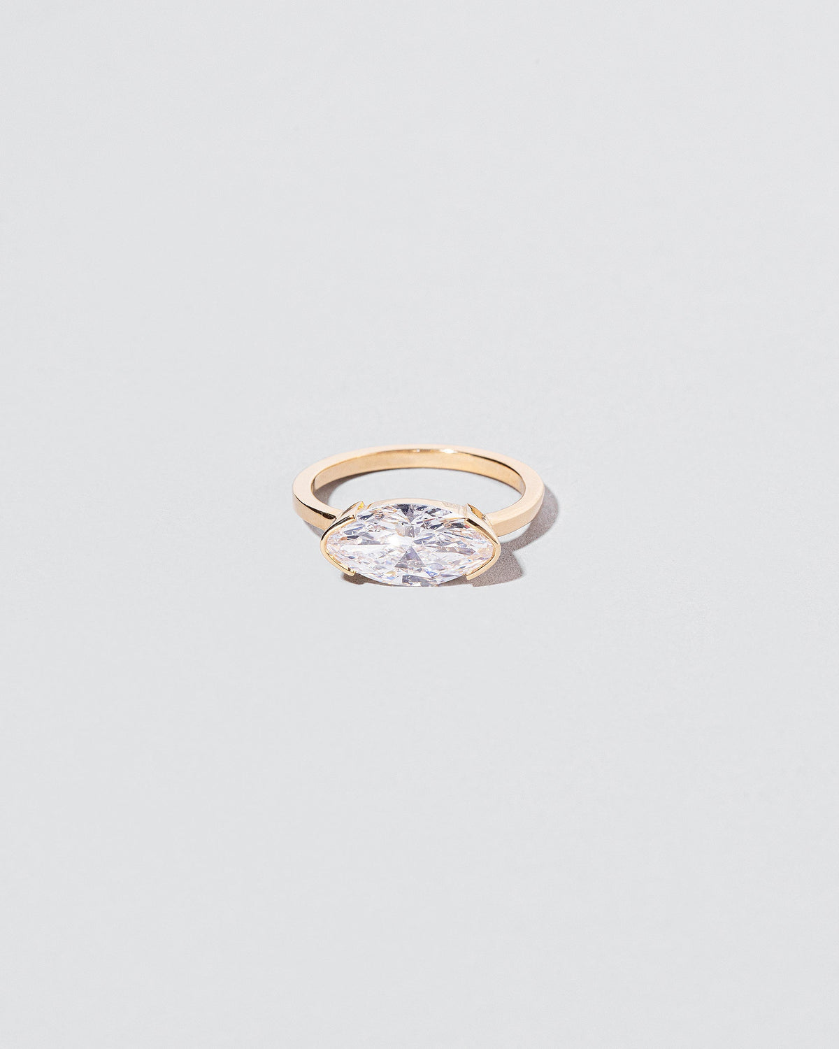 Symmetry Ring on light color background.