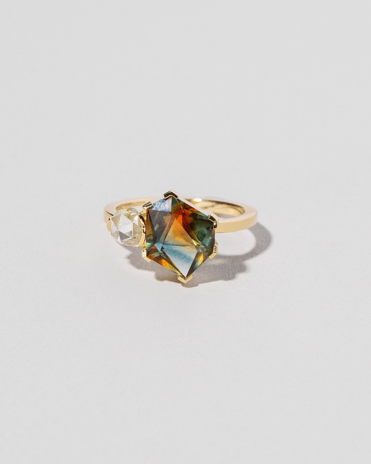  Kaleidoscope Sapphire Geometric Ring on light color background.