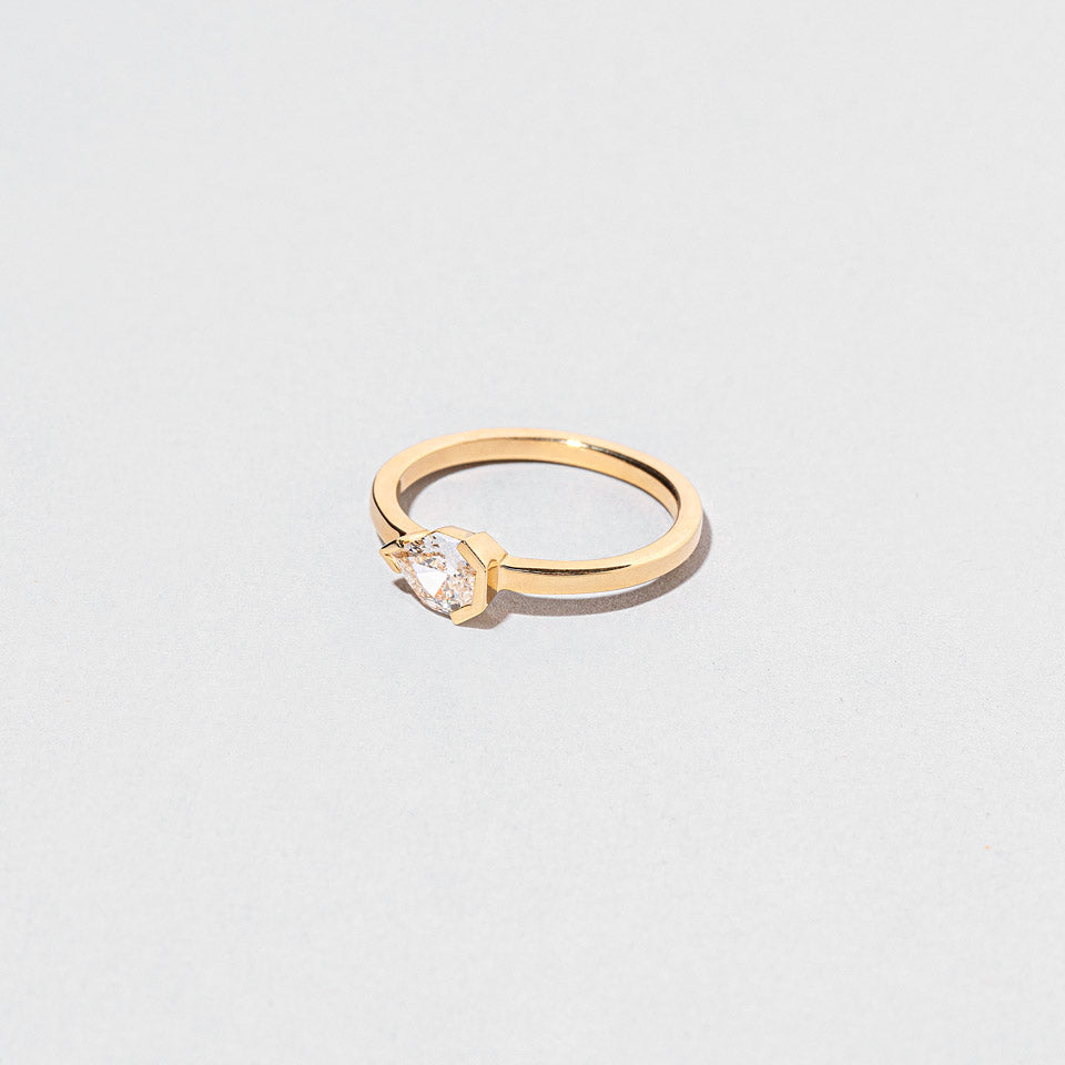 product_details::Closeup details of the Serenna Ring on light color background.