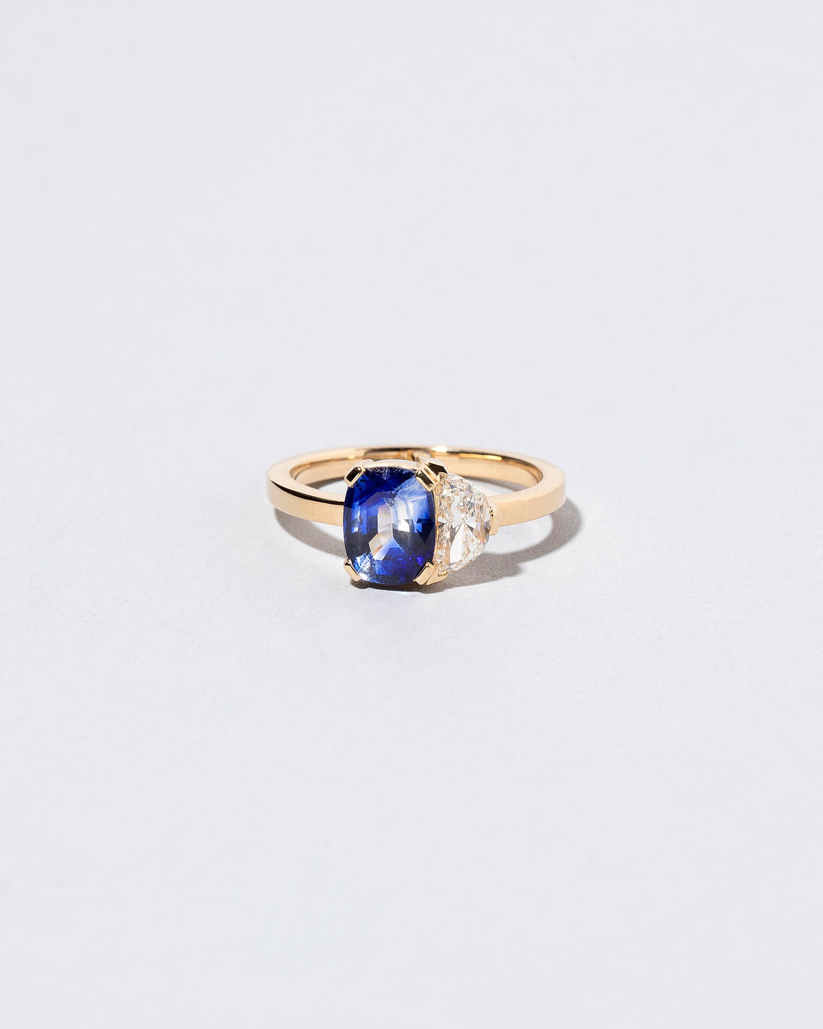  Dualism Ring on light color background.