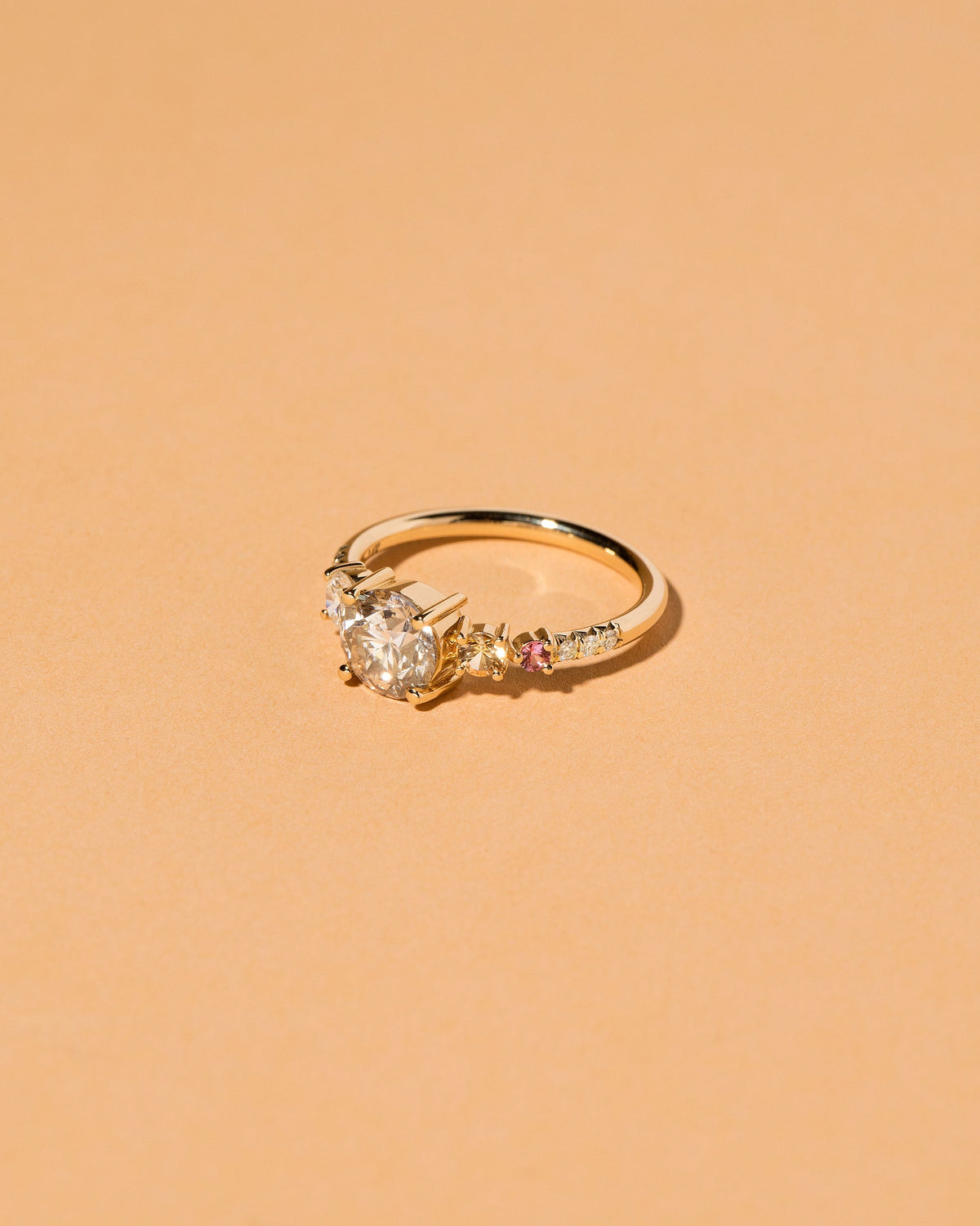  Rhea Ring on light color background.