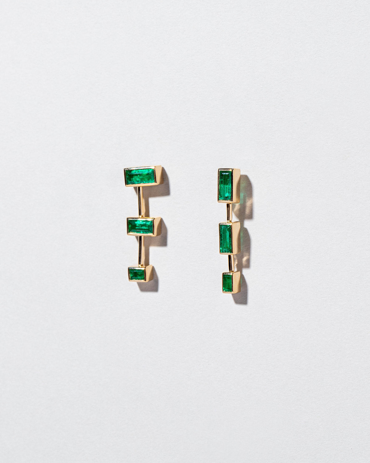  The Listening One Earrings on light color background.
