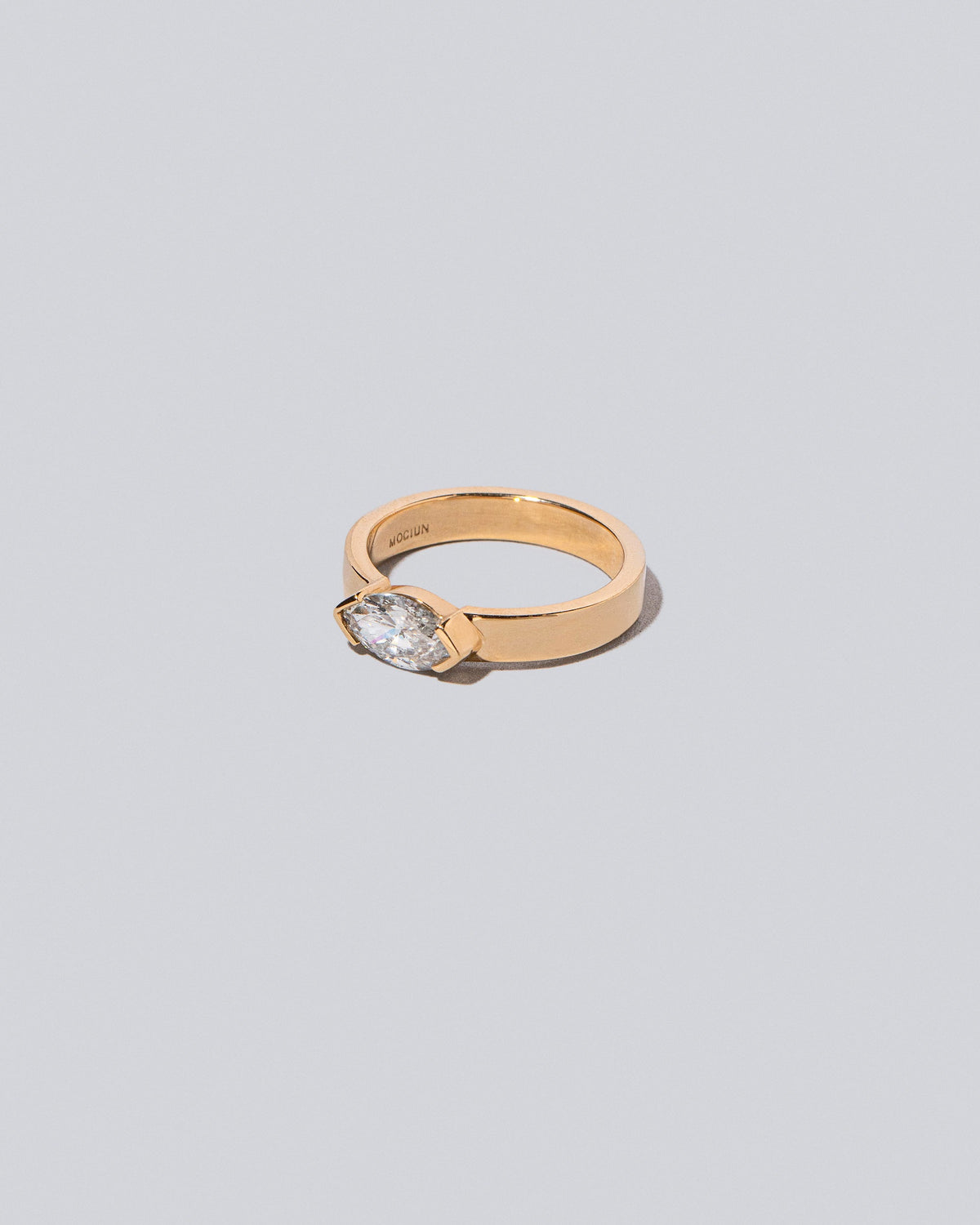 View from the side of the Pocket Ring on light color background.