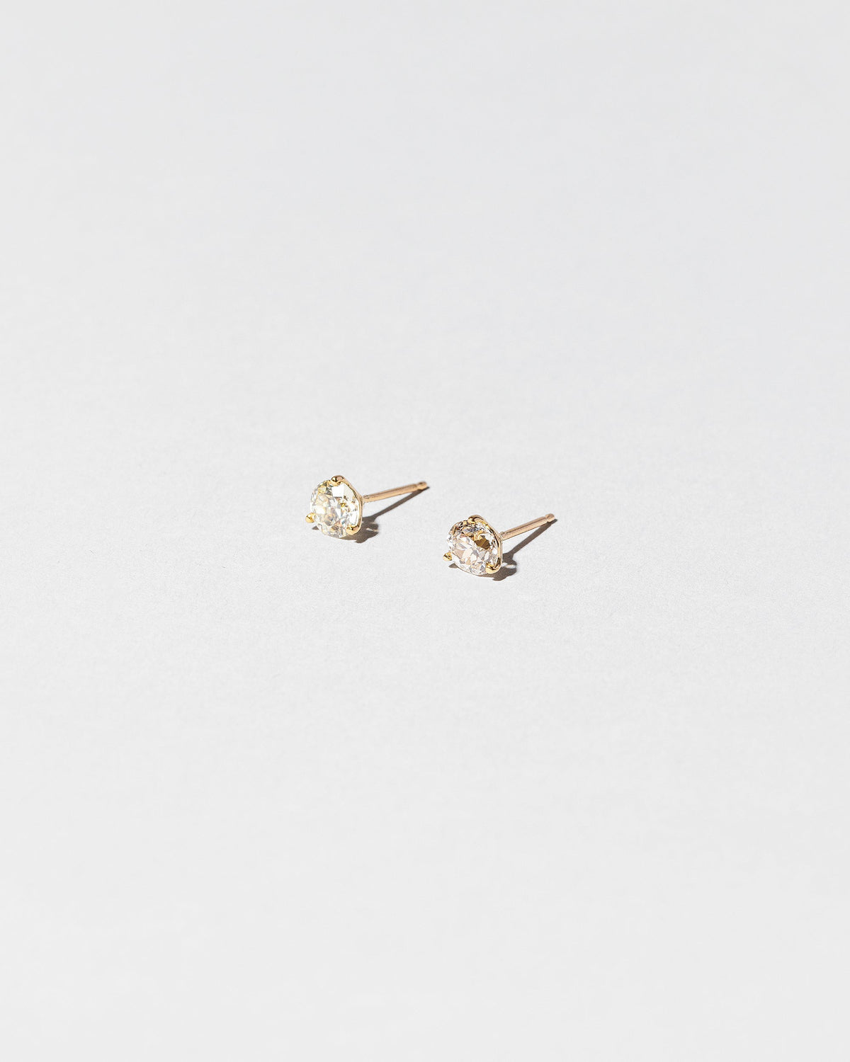  Martini Studs - White Diamond on light color background.