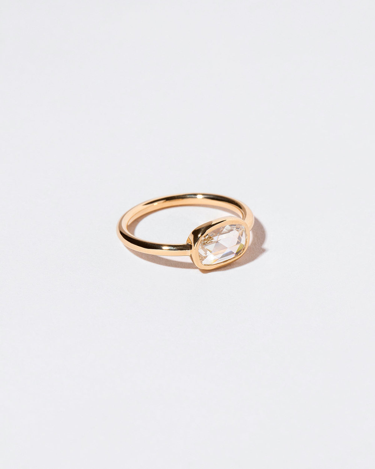 View from the side of the Apollo Ring on light color background.