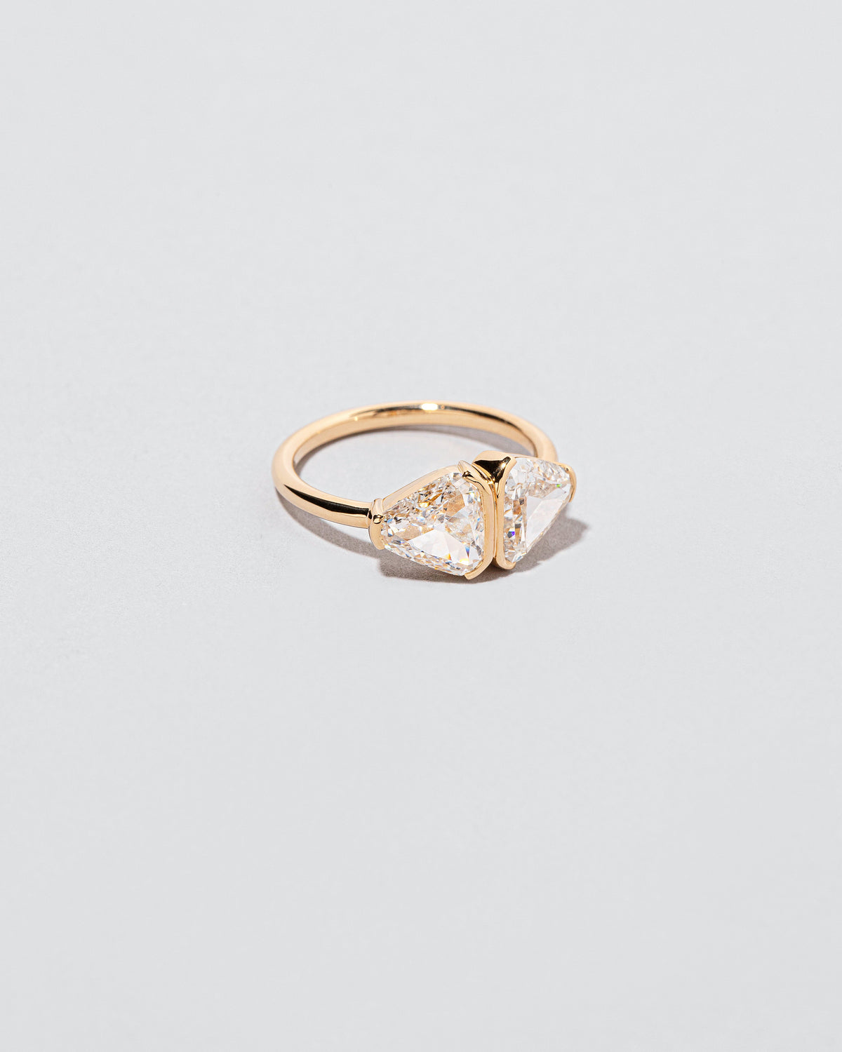 View from the side of the First & Last Ring on light color background.