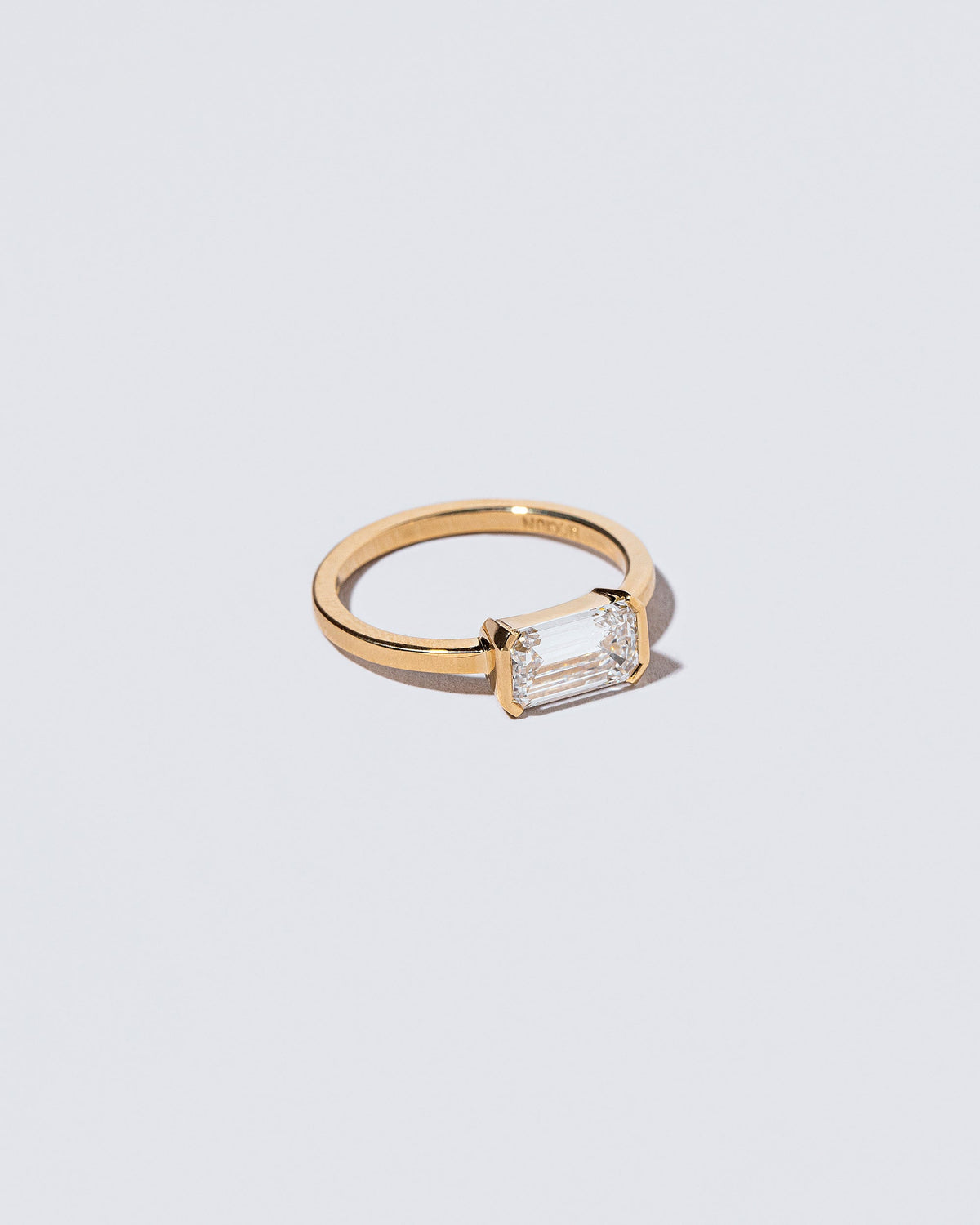 View from the side of the Constant Ring on light color background.