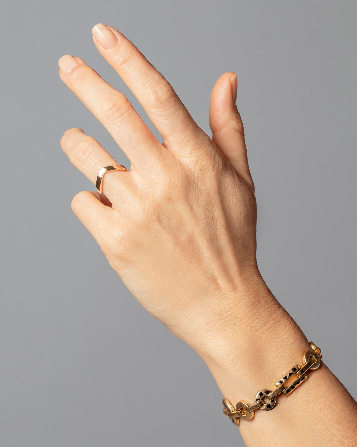 Gold Wide Peak Band on model.