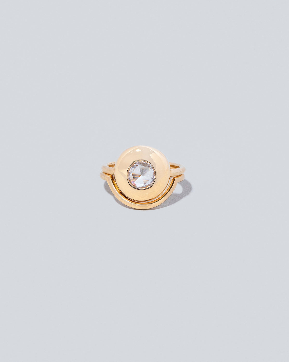 Front view of Exposition Ring with Exposition Band on light color background.