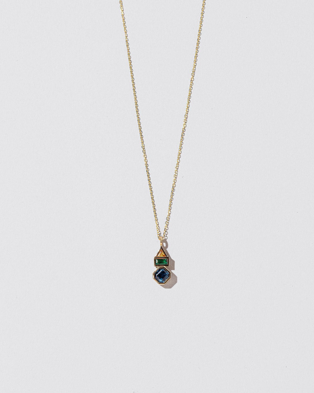  Positive Energy Necklace on light color background.