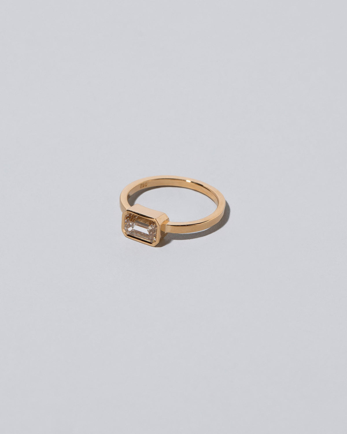 View from the side of the Spectrum Ring on light color background.