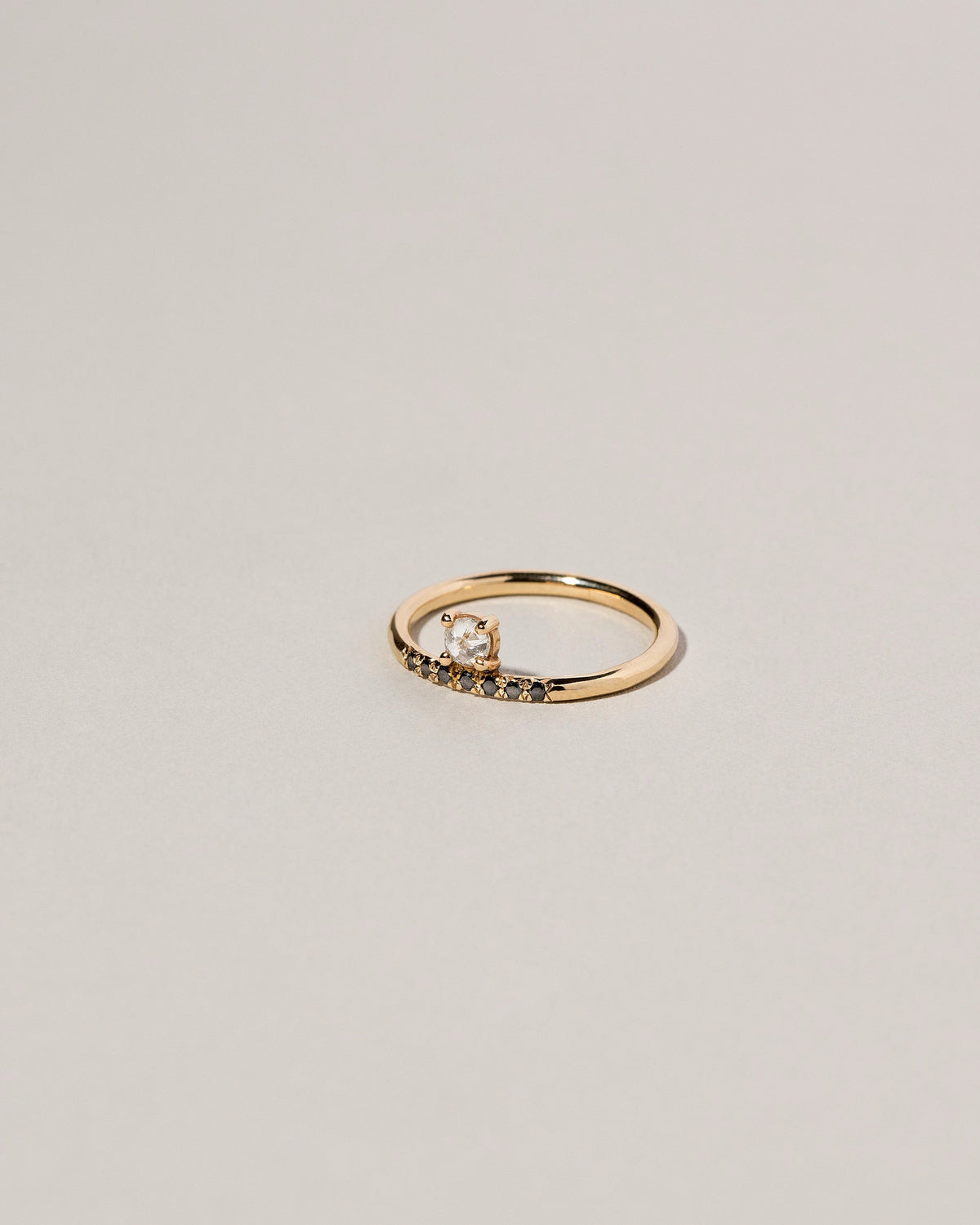  Stacked Ring - White & Black Diamond on light color background.