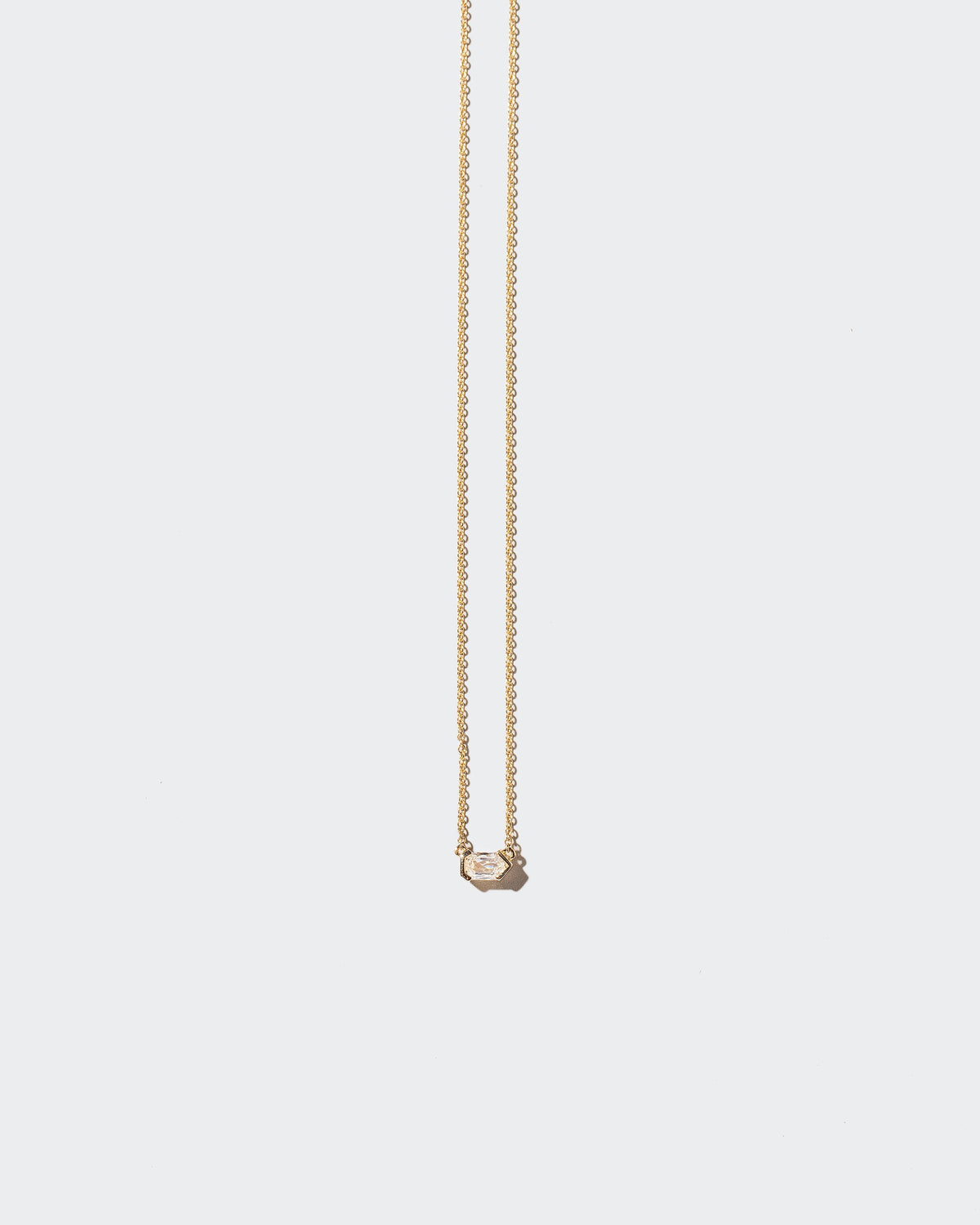  Adder Necklace on light color background.