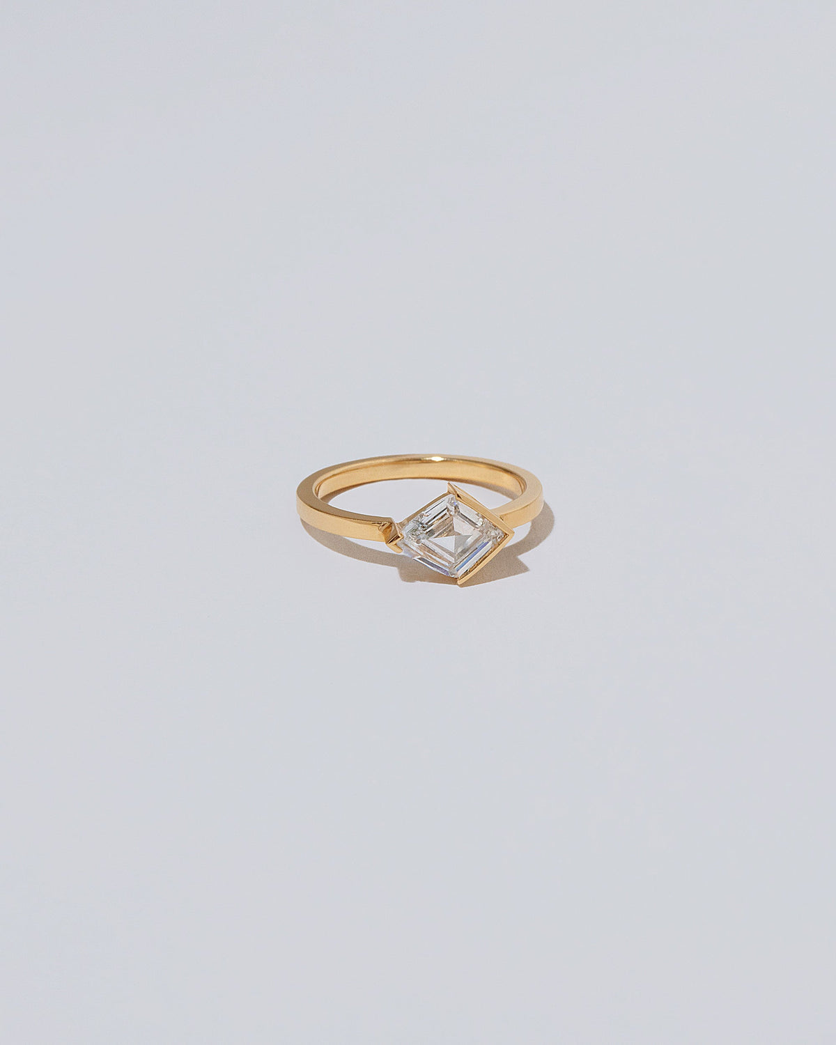 View from the side of the Pirouette Ring on light color background.