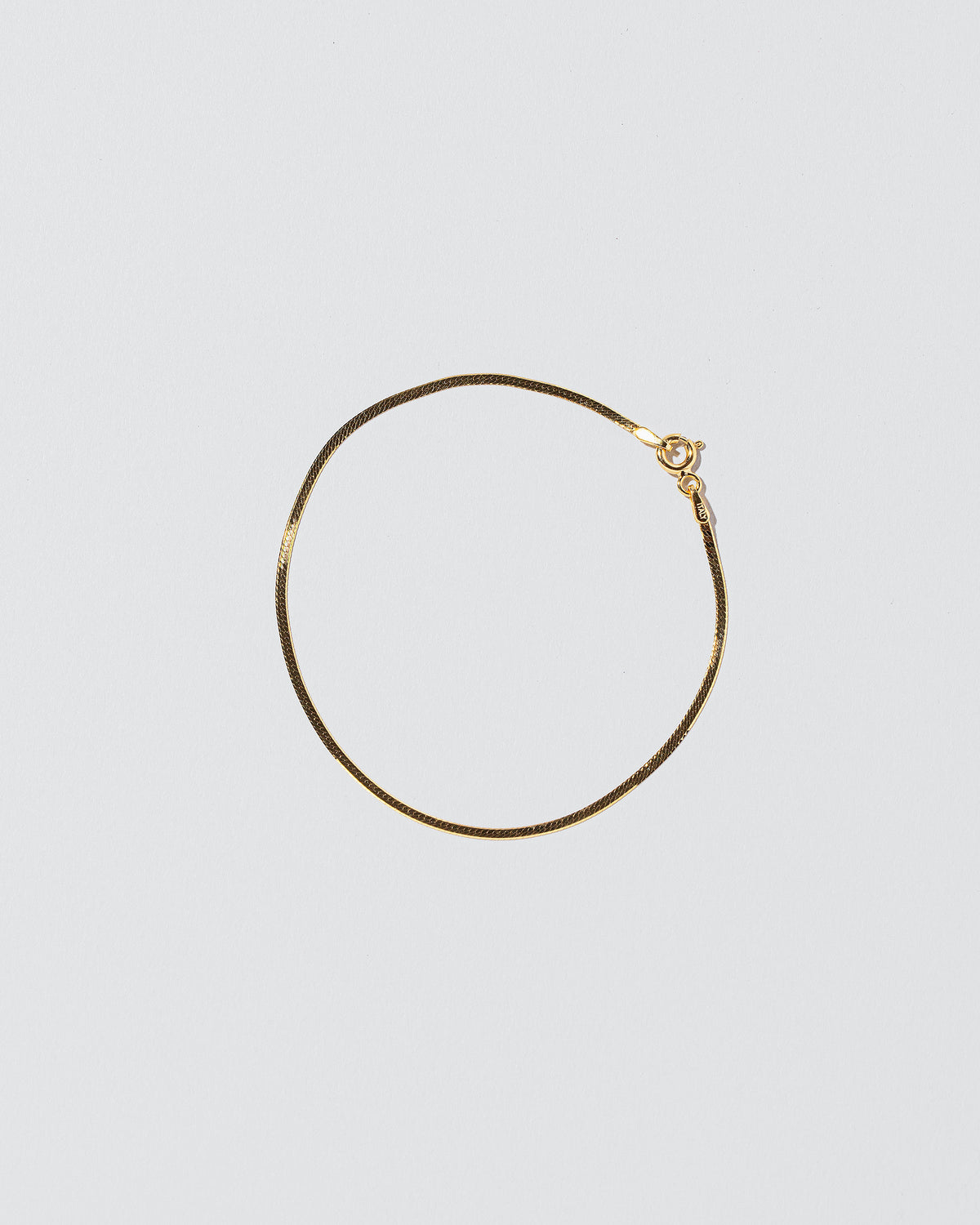  Liquid Chain Bracelet on light color background.