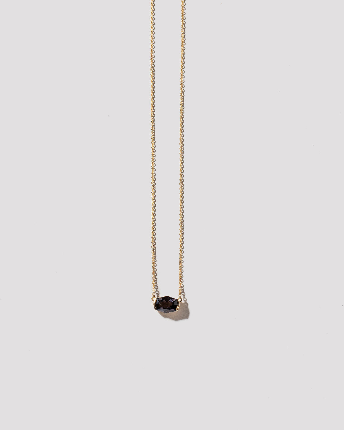 Up Necklace on light color background.