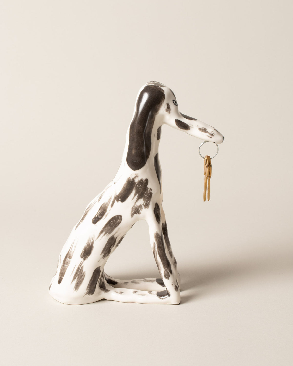 Eleonor Boström Key Dog on light color background.