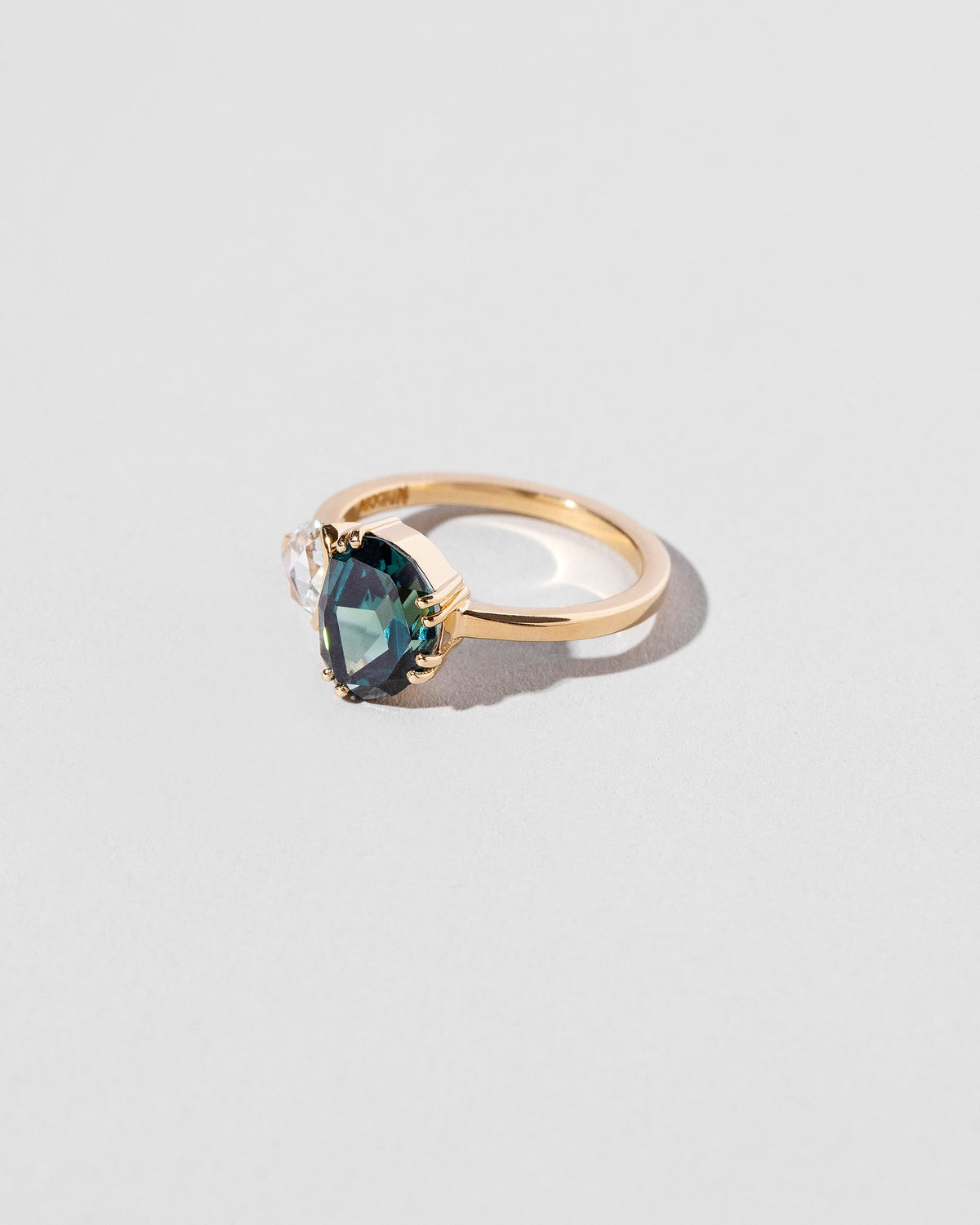  Demeter Ring on light color background.