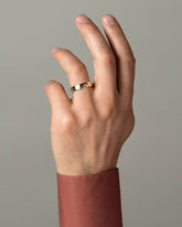 Gold 5mm Half Moon Notch Band on male model.