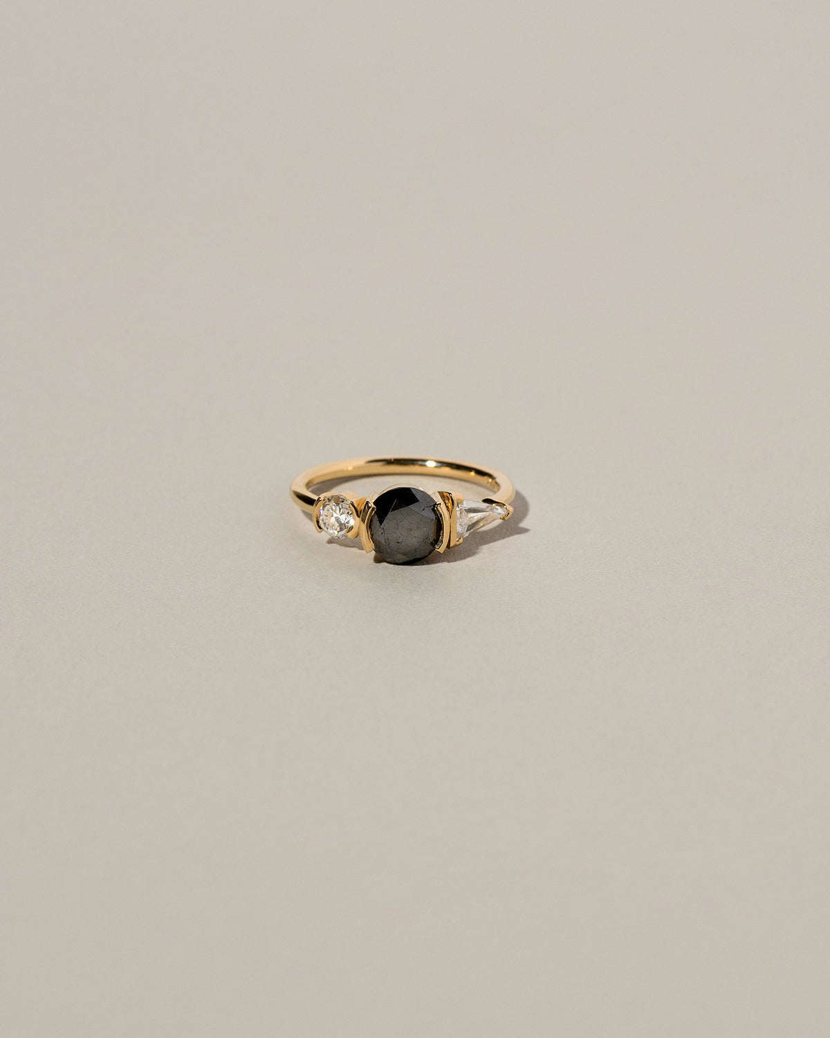  Black and White Diamond Ring on light color background.