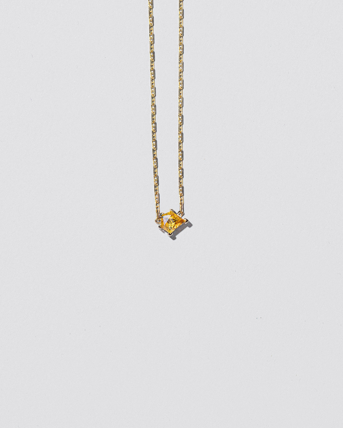  Be True Necklace on light color background.