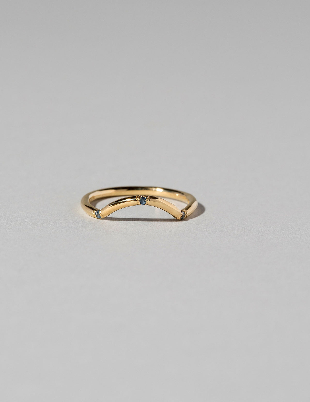  Mini Curve Band - Three Stone on light color background.