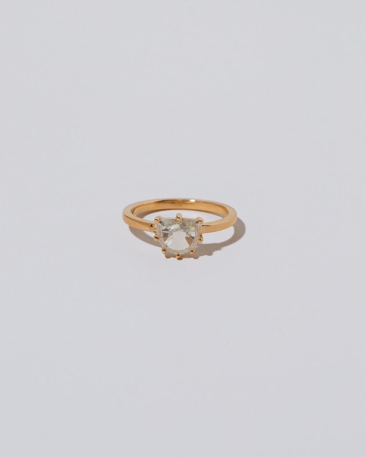Coupé Ring on light color background.