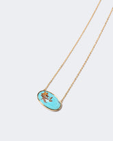 Tranquility Necklace on light color background.