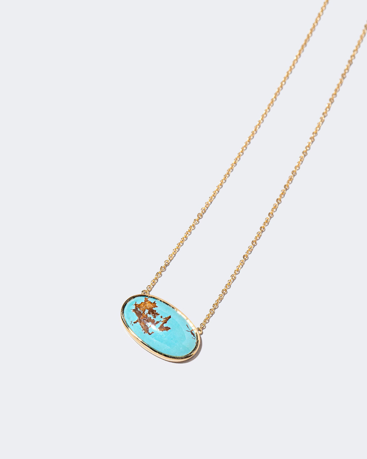 Tranquility Necklace on light color background.