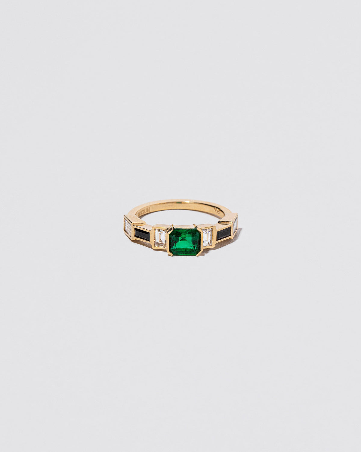  Harmonization Ring on light color background.