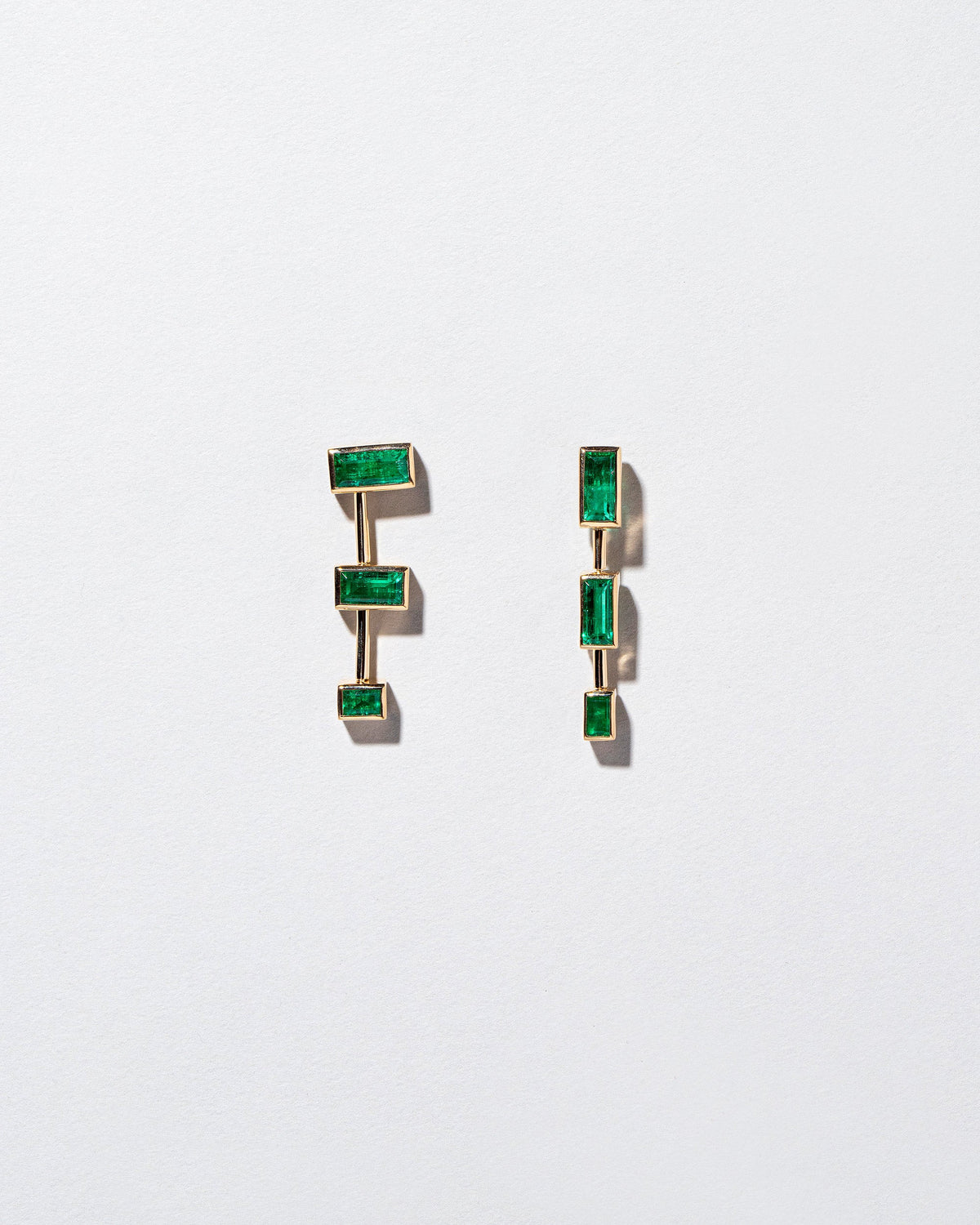  The Listening One Earrings on light color background.
