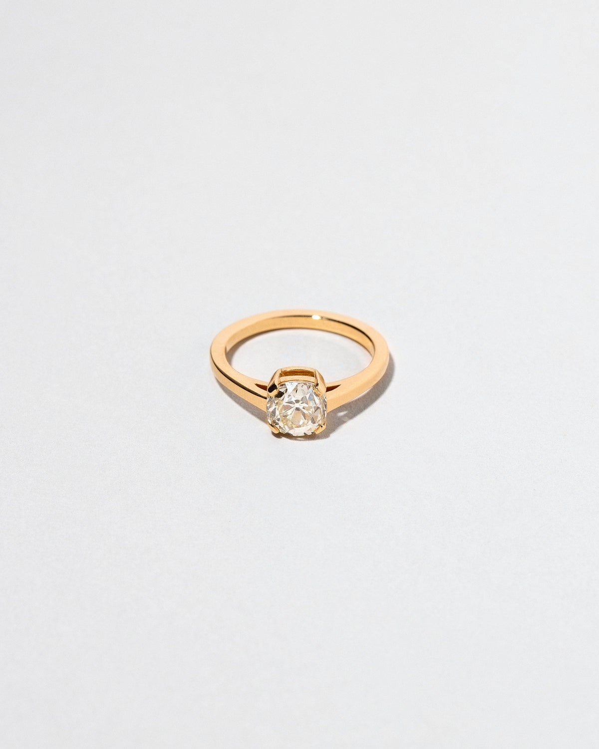 Muchu Ring on light color background.