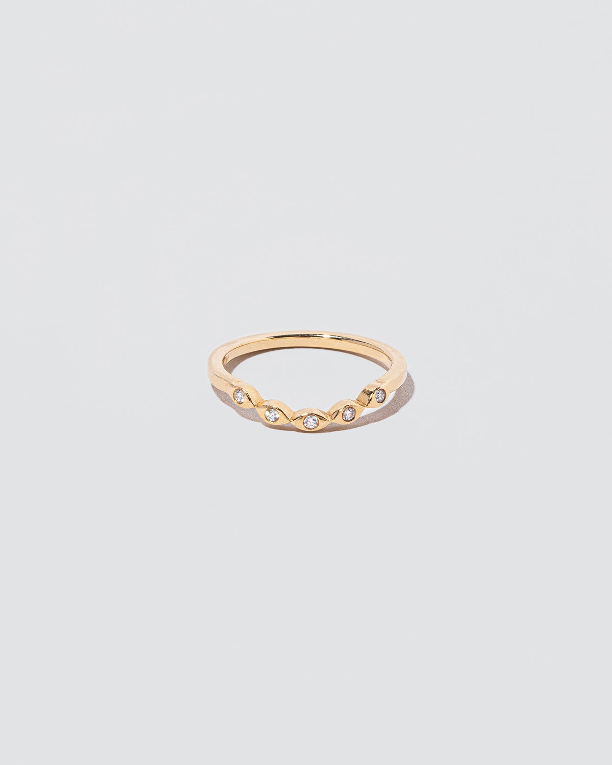 Gold Seeing Eye Band on light color background.
