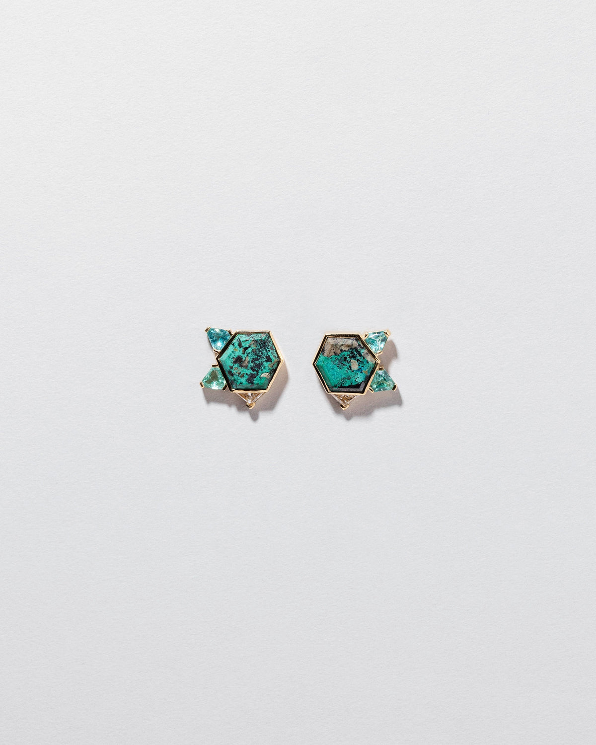  Azure Earrings on light color background.